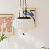 glass and iron pendant light with pure white finish for entryway decor