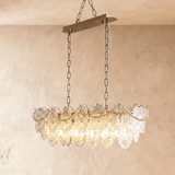 The linear version on its flat bar, petal tiers running along the full length