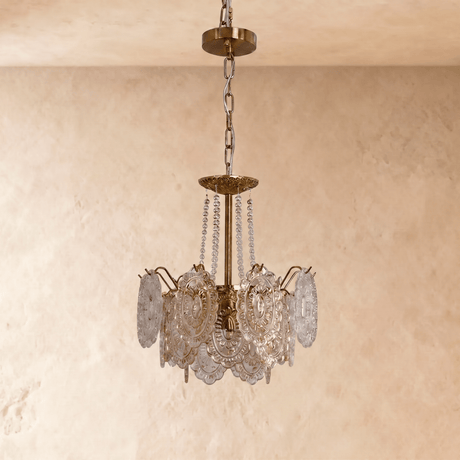 The glass petal tiers switched off, showing the clear pressed pattern in daylight