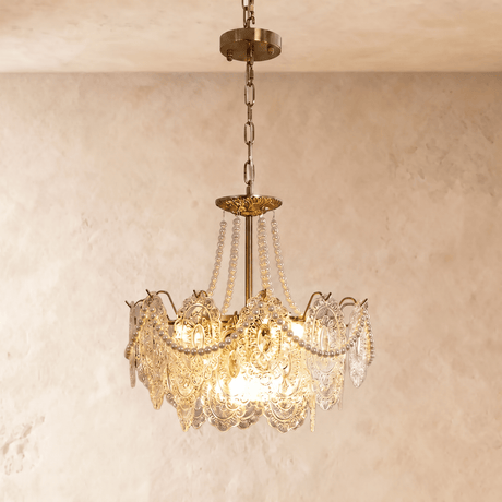 Style A at mid size, three tiers of pressed glass lit from inside the brass frame