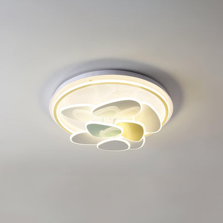 Cloud motif ceiling light lit flat on, the colored shapes visible