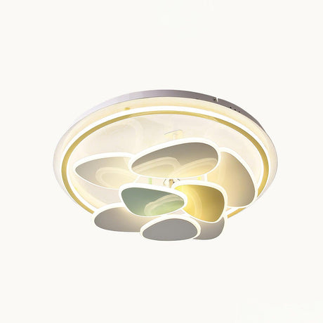 Cloud motif ceiling light lit at an angle on a plain background