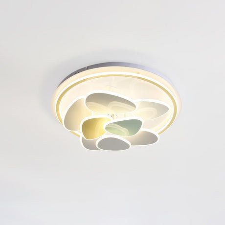 Cloud motif ceiling light lit close to a plain white ceiling