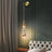 Wall mounted light above dining table