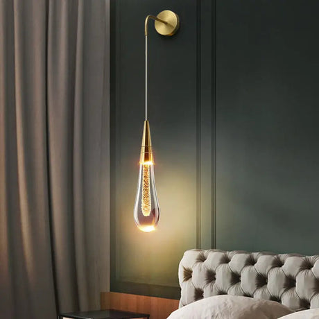 Wall mounted light above dining table