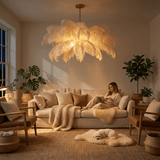 The fitting lit in the evening above a sofa, plants and a low wooden table