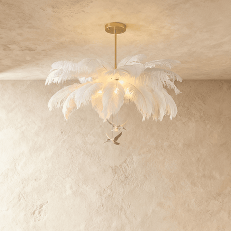 The sparse version, feathers spread wide with two small bird figures hanging below