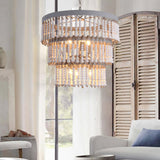 Lit in a pale living room beside a curtain and folding wood shutters