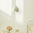 Cream glass pendant light with sleek modern silhouette