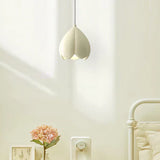 Cream glass pendant light with sleek modern silhouette
