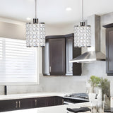 Black crystal pendant light with bold geometric silhouette