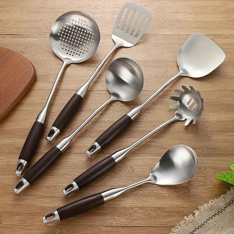 Gold stainless steel kitchen utensil set with wooden handles