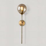 Glass orb wall lamp for kitchen decor