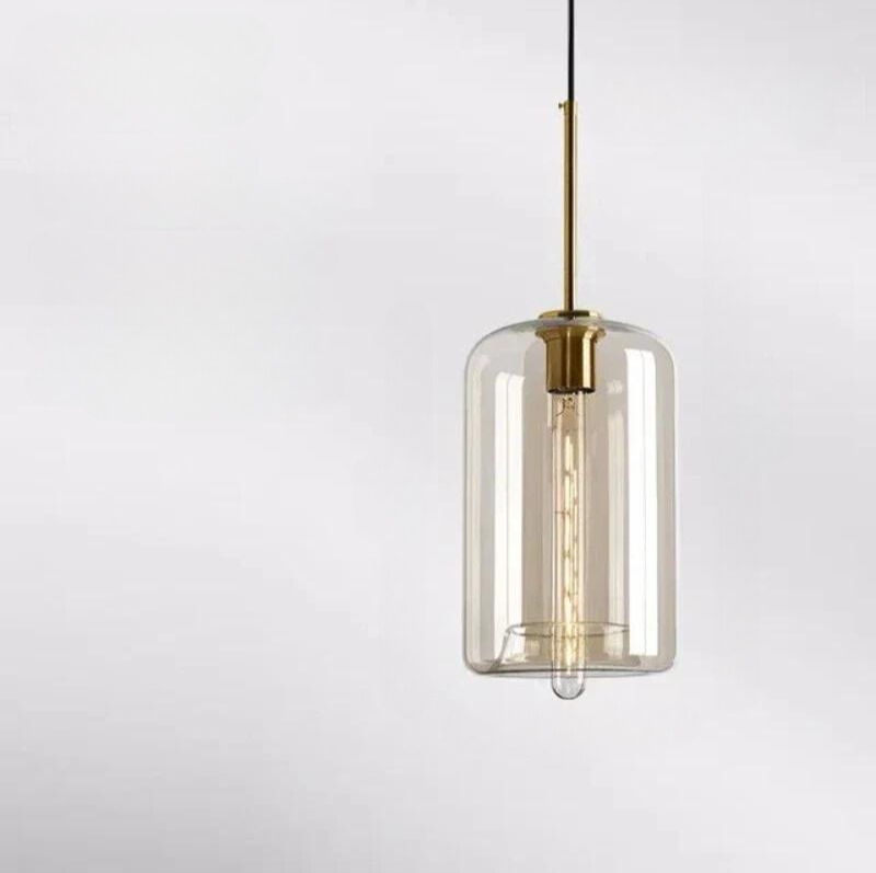 Minimalist Pendant Lamp Installed Above Dining Table