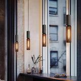 Iron and cement pendant light with rustic finish