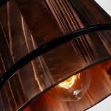 Wood and iron hanging lamp close-up detail