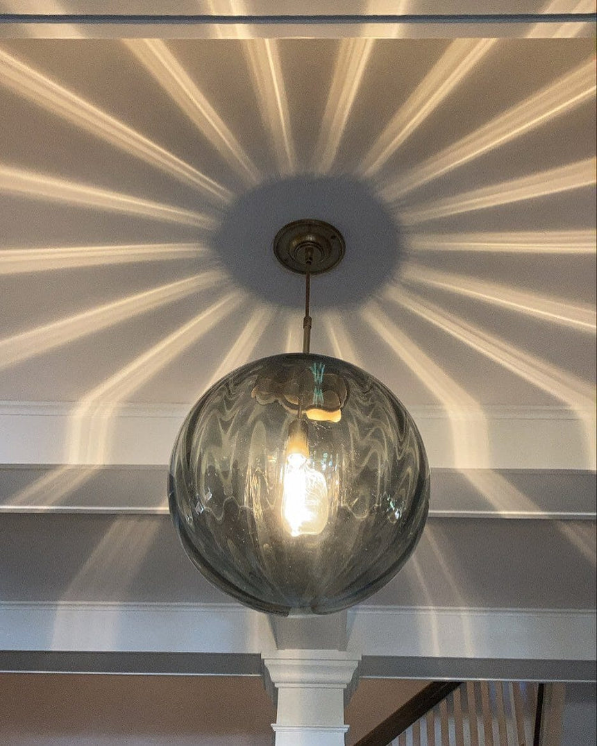 Bubble Glass Pendant Light Illuminated with Warm Ambient Glow | OroDwell
