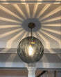 Bubble Glass Pendant Light Illuminated with Warm Ambient Glow | OroDwell
