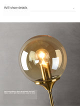 Glass ball wall light in a dining nook