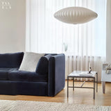Aurelle Metal Pendant Light lifestyle scene – living room | OroDwell