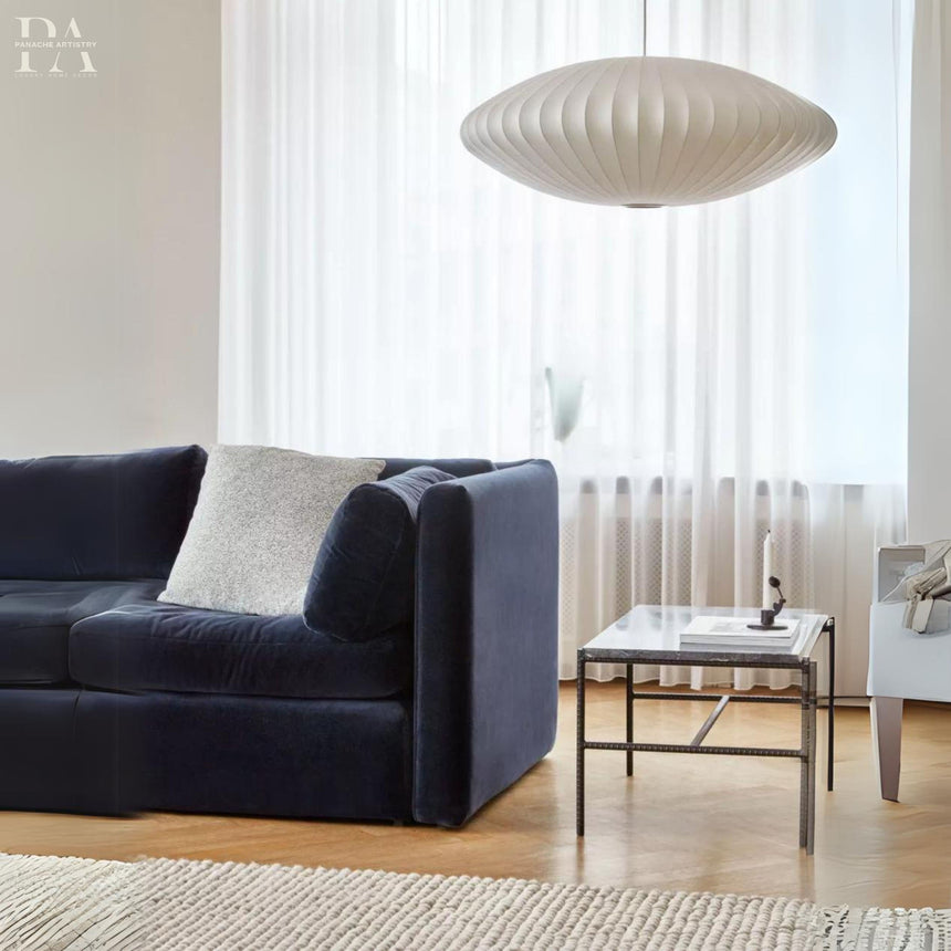 Aurelle Metal Pendant Light lifestyle scene – living room | OroDwell
