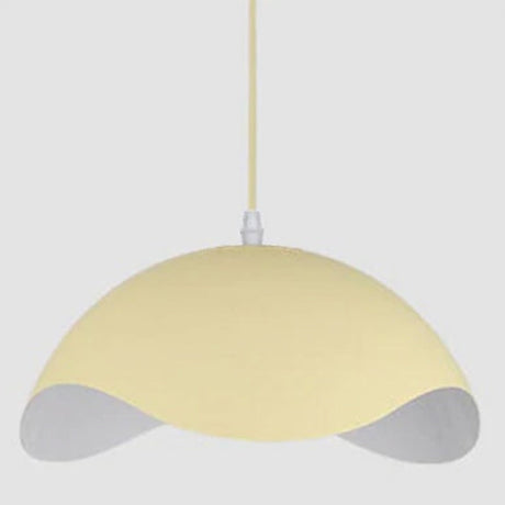 Black Pendant Light Installed Above Dining Table