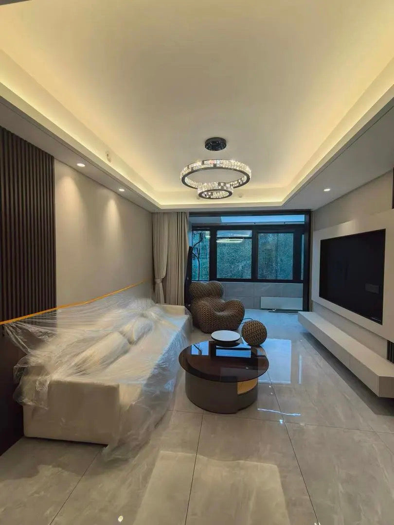 ring chandelier installed in living room