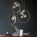 Glass globe pendant light for open-concept kitchen