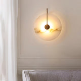 CelesteLume Alabaster LED Disc Sconce with Black Arm - OpalDwell