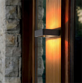 Weatherproof wall sconce for outdoor space