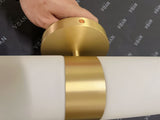 Wall sconce shown above a sofa