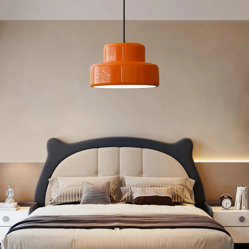 Orange Pendant Lamp Installed Above Dining Table