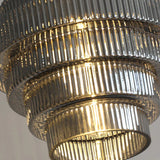 Brass pendant light installed above dining table