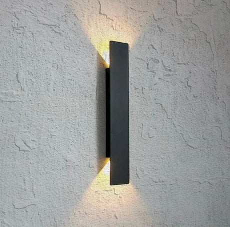Wall light mounted near a front door