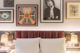 Wall sconce in modern bedroom setting