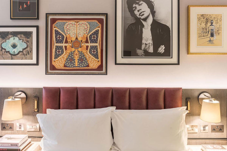Wall sconce in modern bedroom setting