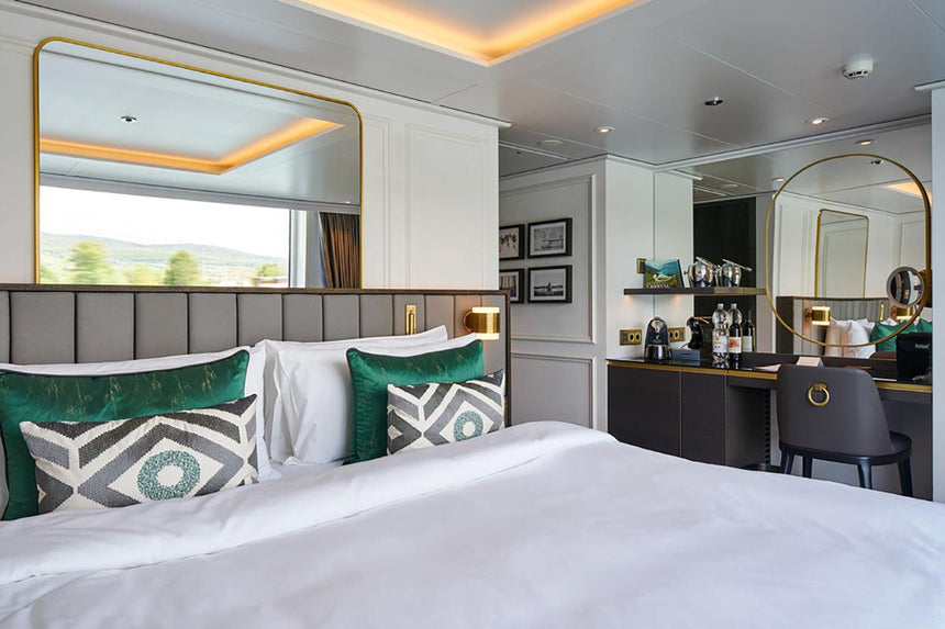 Wall sconce paired with bedside decor