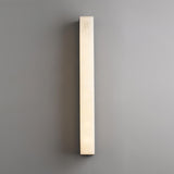 brass and alabaster wall-mounted lamp for bedroom lighting