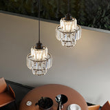 Crystal ceiling light illuminated in hallway setting