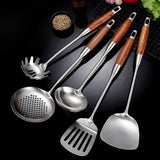 Silver and gold utensil set close-up finish
