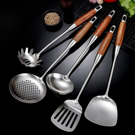 Silver and gold utensil set close-up finish