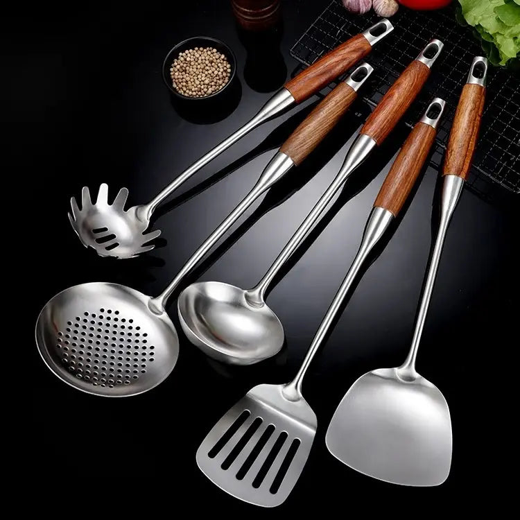 Silver and gold utensil set close-up finish