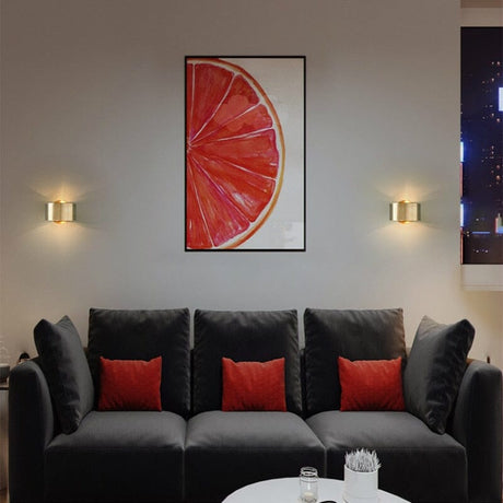 Metal wall light with wedge base