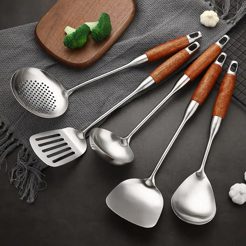 Kitchen utensils with natural wooden handle detail