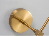 Wall light mounted beside a fireplace