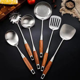 Utensil set with polished gold finish detail