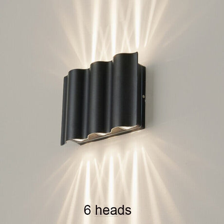 Garden accent light mounted on exterior wall