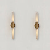 Iron and glass wall lamp finish detail