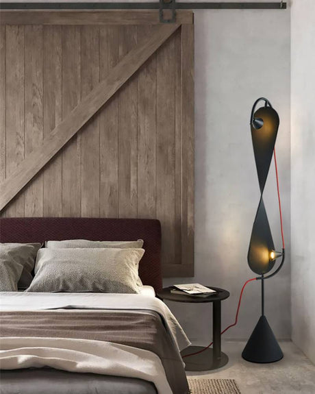 Sculptural black floor lamp base detail