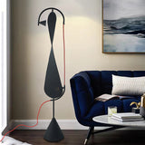 Black artistic standing lamp with fabric shade